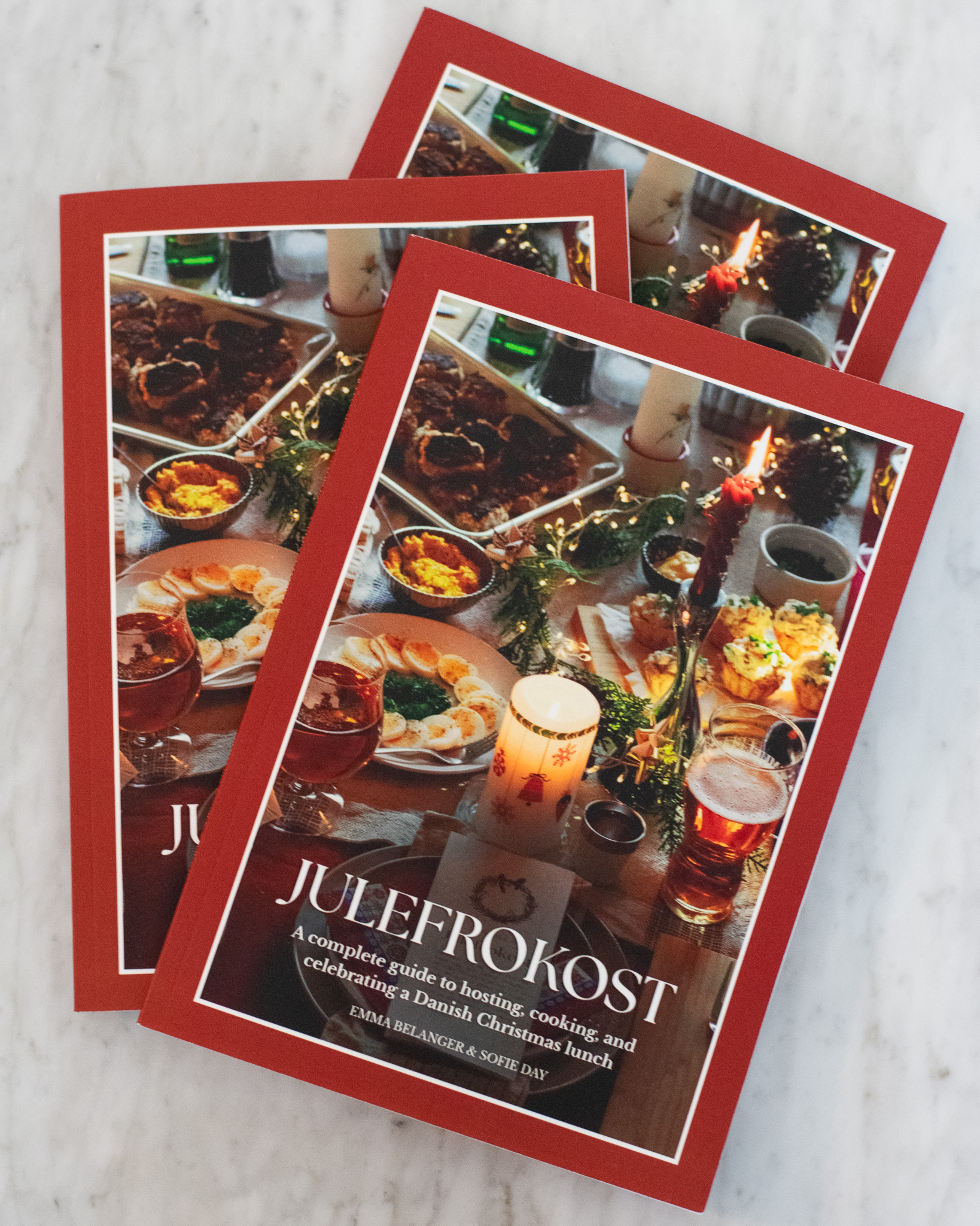 A stack of paperback Christmas lunch books.